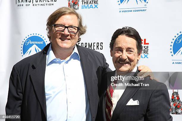 Peter Cullen the voice of Optimus Prime and Lorenzo di Bonaventura attend the Transformer Optimus Prime hand/footprint ceremony held at TCL Chinese...