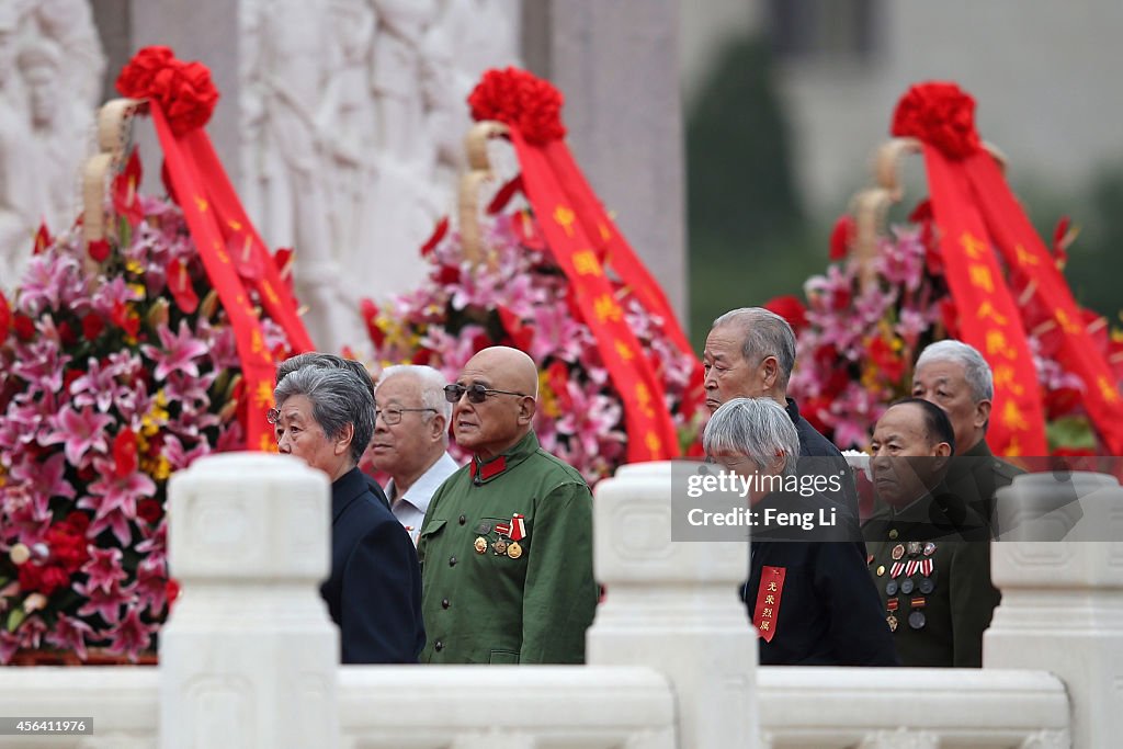 Chinese Leaders Lay Floral Baskets To The Monument To The People's Heroes