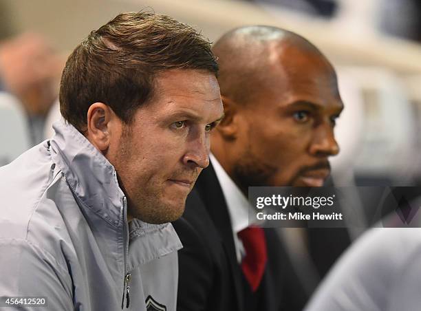 Cardiff caretaker managers Scott Young and Danny Gabbidon look on during the Sky Bet Championship match between Brighton & Hove Albion and Cardiff...