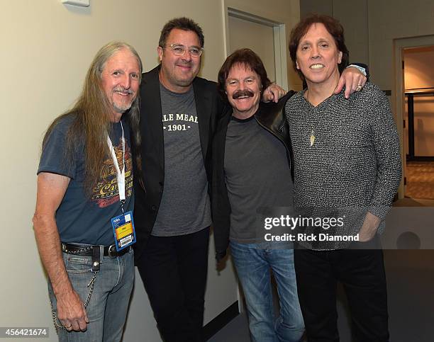 Vince Gill poses with Patrick Simmons, Tom Johnston and John McFee of The Doobie Brothers backstage at the Honors & Awards Ceremony during Day 4 of...