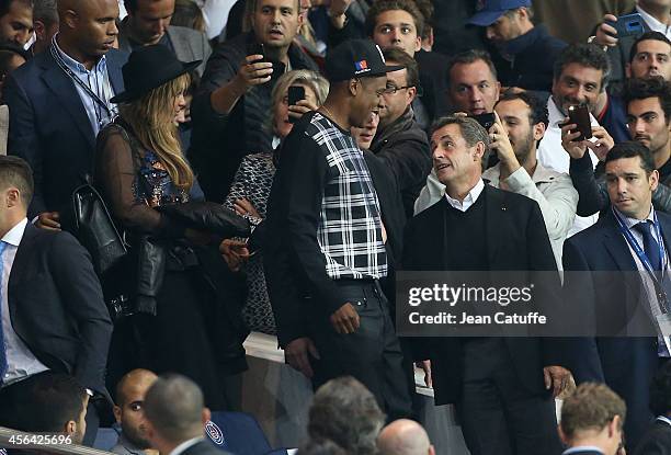 Beyonce, Jay Z and Nicolas Sarkozy attend the UEFA Champions League Group F match between Paris Saint-Germain FC and FC Barcelona at the Parc des...