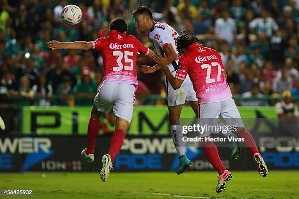 Jesus Zavala of Monterrey heads the ball to score during a match between Leon and Monterrey as part of 11th round Apertura 2014 Liga MX at Leon...