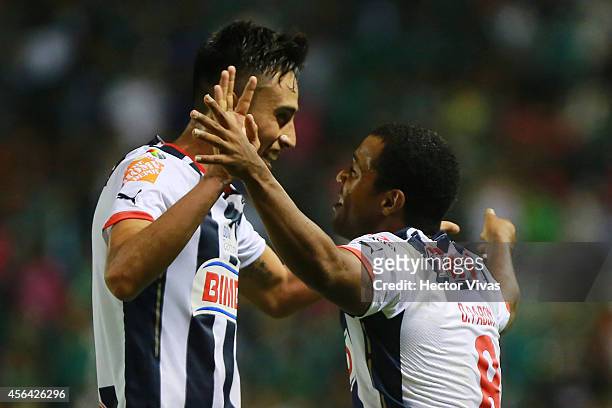 Dorlan Pabon of Monterrey celebrate with Jesus Zavala of Monterrey after scoring the third goal of his team during a match between Leon and Monterrey...