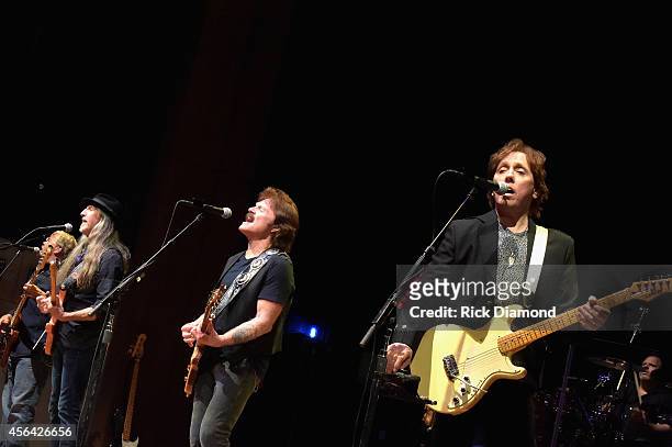 Patrick Simmons, Tom Johnston and John McFee of The Doobie Brothers perform onstage at the Honors & Awards Ceremony during Day 4 of the IEBA 2014...