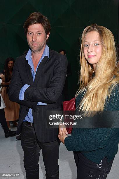 Cyril Troubetzkoy from La Blanchisserie Galerie and his daughter attend the Jean Charles de Castelbajac show as part of the Paris Fashion Week...