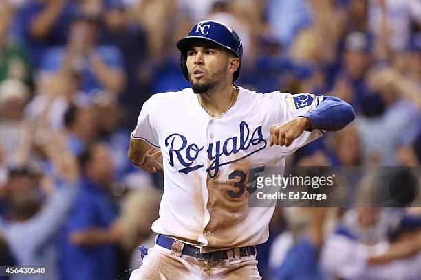 Eric Hosmer of the Kansas City Royals reacts after scoring on a single by Christian Colon in the 12th inning against the Oakland Athletics during the...