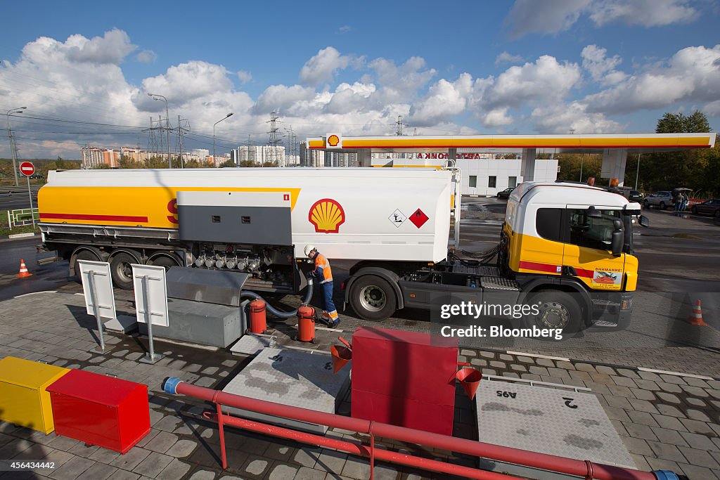 Shell Tea Tanker A new Royal Dutch Shell Plc tanker truck delivers fuel to a Shell gas ...