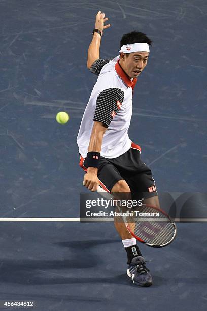 Kei Nishikori of Japan in action during the men's singles second round match against Ivan Dodig of Croatia on day three of Rakuten Open 2014 at...