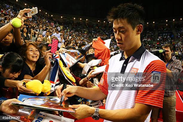 Kei Nishikori of Japan interact with fans after winning the men's singles second round match against Ivan Dodig of Croatia on day three of Rakuten...