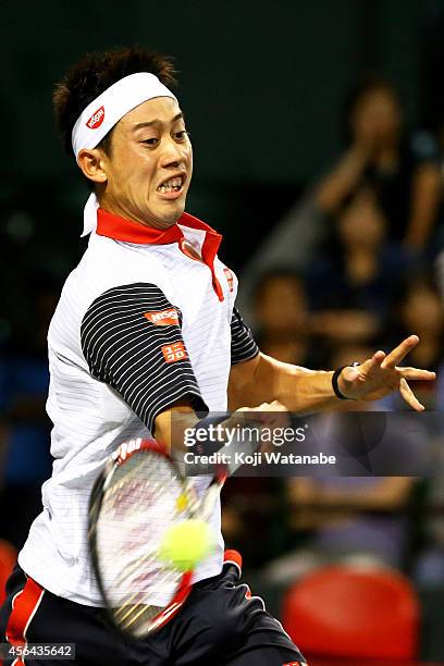 Kei Nishikori of Japan in action during men's singles second round match against Ivan Dodig of Croatia on day three of Rakuten Open 2014 at Ariake...