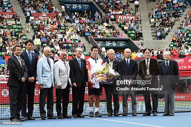 Kei Nishikori poses with Japanese tennis legends Ryuzo Tsujino, Syuzo Matsuoka, Koji Watanabe, Isao Watanabe, Nobuo Kuroyanagi, Michio Fujii, Ichizo...