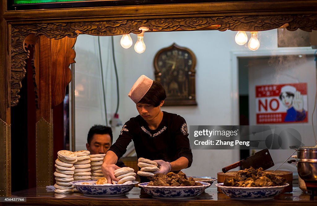 Rou jia mo, a kind of Chinese hamburger, is a street food...