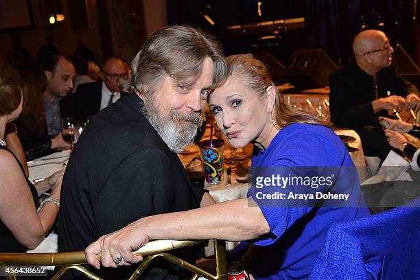 Mark Hamill and Carrie Fisher attend the Midnight Mission's 100 year anniversary Golden Heart Gala held at the Beverly Wilshire Four Seasons Hotel on...