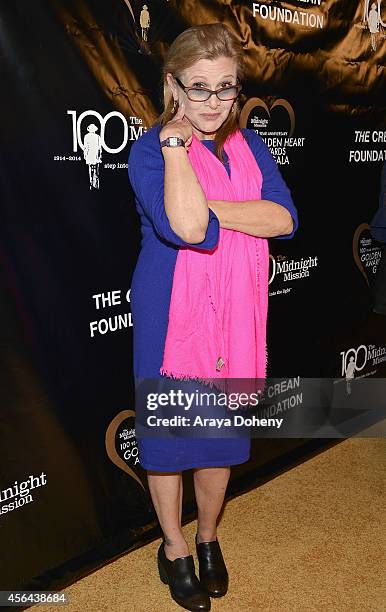Carrie Fisher attends the Midnight Mission's 100 year anniversary Golden Heart Gala held at the Beverly Wilshire Four Seasons Hotel on September 30,...