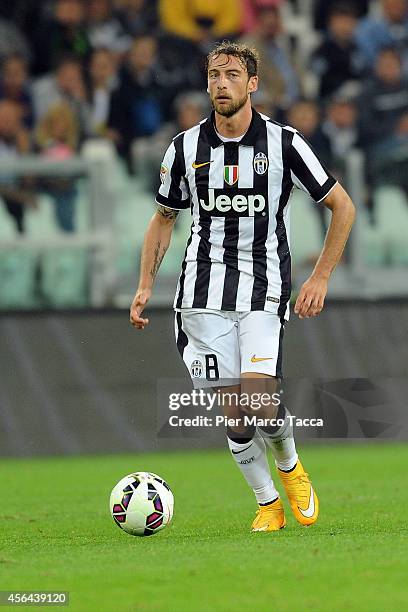 Claudio Marchisio of FC Juventus in action during the Serie A match between Juventus FC and AC Cesena at Juventus Arena on September 24, 2014 in...