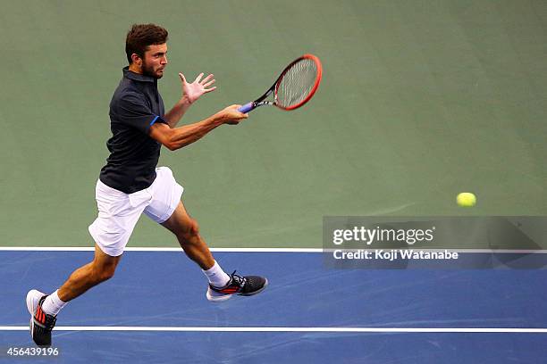 Gilles Simon of France in action during the men's singles second round match against Gilles Muller of Germany on day three of Rakuten Open 2014 at...