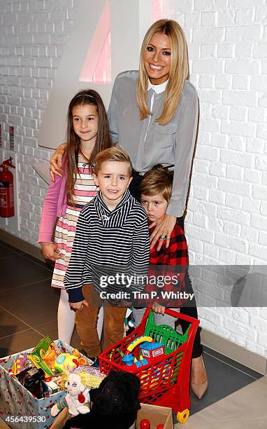 Tess Daly attends a photocall to launch the Argos Toy Exchange on October 1, 2014 in London, England.