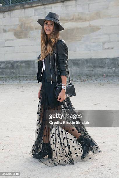 Fashion Blogger Soraya Bakhtiar is wearing a Preston and Olivia hat, Zara jacket, Sass and Bide skirt and Laurence Dacade boots on day 7 of Paris...