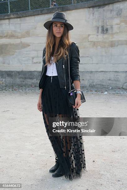 Fashion Blogger Soraya Bakhtiar is wearing a Preston and Olivia hat, Zara jacket, Sass and Bide skirt and Laurence Dacade boots on day 7 of Paris...