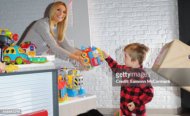 Tess Daly attends a photocall to launch the Argos Toy Exchange on October 1, 2014 in London, England.