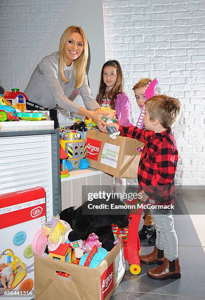 Tess Daly attends a photocall to launch the Argos Toy Exchange on October 1, 2014 in London, England.