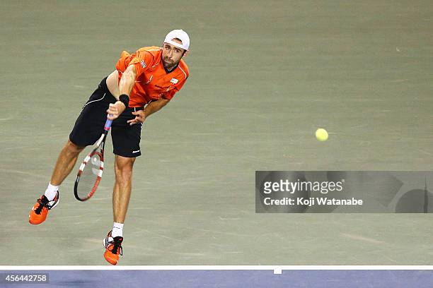 Benjamin Becker of Germany in action during the men's singles second round match against Tatsuma Ito of Japan on day three of Rakuten Open 2014 at...