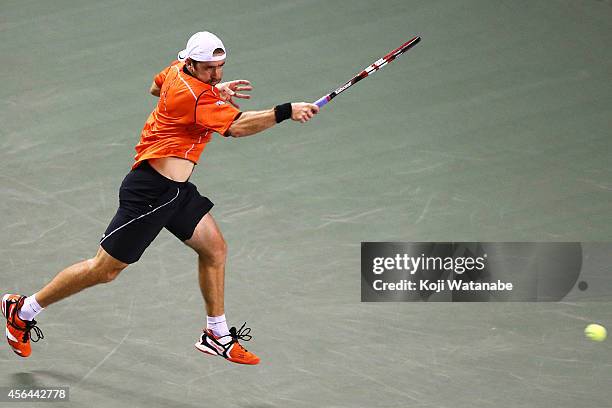 Benjamin Becker of Germany in action during the men's singles second round match against Tatsuma Ito of Japan on day three of Rakuten Open 2014 at...