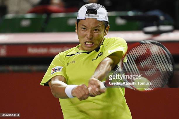 Tatsuma Ito of Japan in action during the men's singles second round match against Benjamin Becker of Germany on day three of Rakuten Open 2014 at...