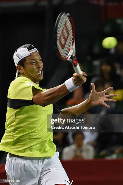 Tatsuma Ito of Japan in action during the men's singles second round match against Benjamin Becker of Germany on day three of Rakuten Open 2014 at...