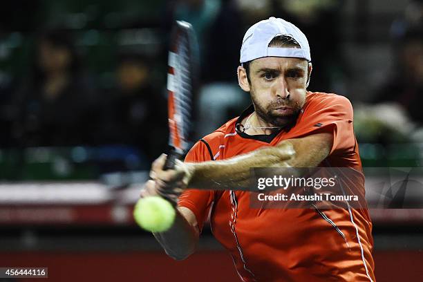 Benjamin Becker of Germany in action during the men's singles second round match against Tatsuma Ito of Japan on day three of Rakuten Open 2014 at...