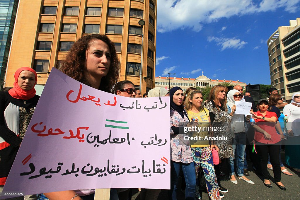 Lebanese teachers protest in front of Parliament building in Beirut