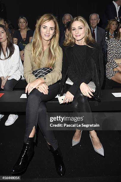 Alexia Niedzielski and Olivia Palermo attend the Moncler Gamme Rouge show as part of the Paris Fashion Week Womenswear Spring/Summer 2015 on October...