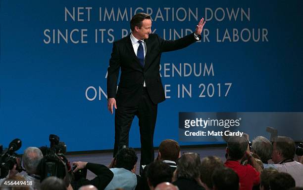 Prime Minister David Cameron arrives to give his keynote speech to the Conservative party conference on October 1, 2014 in Birmingham, England. The...