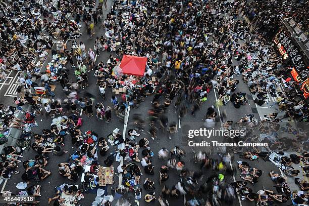 Pro-democracy demonstrators near the Government Complex in Hong Kong on October 1, 2014 in Hong Kong, Hong Kong. Thousands of pro democracy...