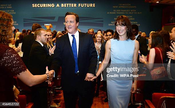 Prime Minister David Cameron and his wife Samantha leave the stage following his keynote speech to the Conservative party conference on October 1,...