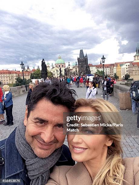 Model Adriana Karembeu with her husband Aram Ohanian are photographed for Paris Match on August 31, 2014 in Prague, Czech Republic.