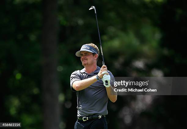 John Peterson hits his second shot on the 10th hole during the second round of the Chiquita Classic held at River Run Country Club on September 5,...