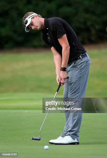 Brett Stegmaier reacts as his eagle putt misses on the sixth green during the second round of the Chiquita Classic held at River Run Country Club on...