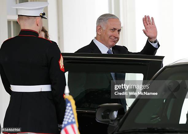 Israeli Prime Minister Benjamin Netanyahu waves as he leaves the west wing of the White House following a meeting with U.S. President Barack Obama...