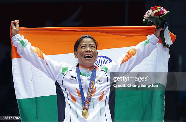 Mary Kom of India celebrates after winning the Womens Flyweight Final on day twelve of the 2014 Asian Games at Seonhak Gymnasium on October 1, 2014...