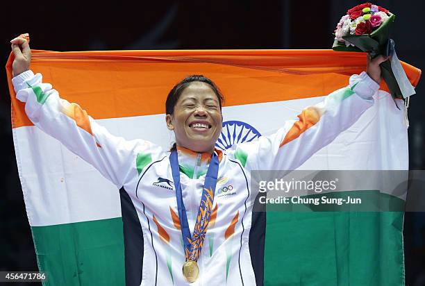 Mary Kom of India celebrates after winning the Womens Flyweight Final on day twelve of the 2014 Asian Games at Seonhak Gymnasium on October 1, 2014...