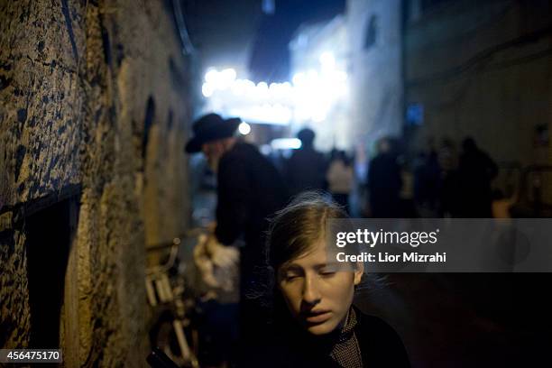 An Ultra-Orthodox Jewish woman seen during the Kaparot ceremony on October 01, 2014 in Jerusalem, Israel. The Jewish ritual is supposed to transfer...