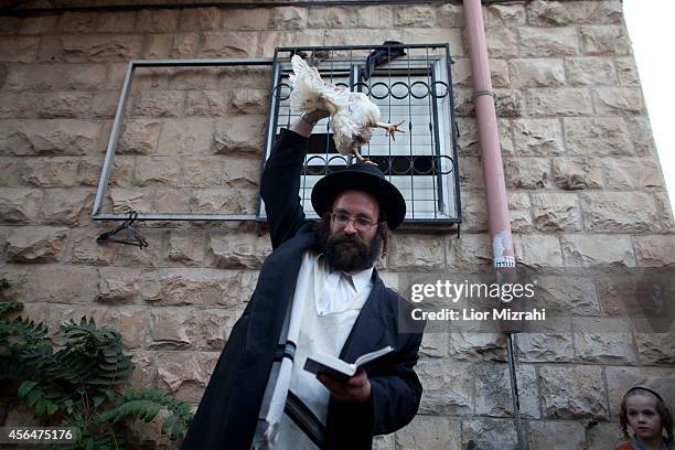 Kaparot Ritual Kaparot Ceremony Performed In Israel Photos and Premium High Res ...