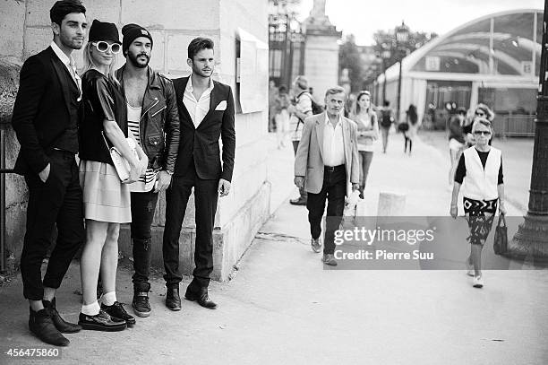 People outside the 'Valentino' show at 'Jardin des Tuilleries' on September 30, 2014 in Paris, France.