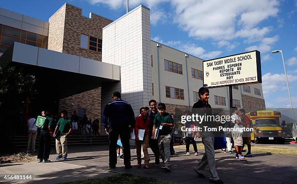 Students are dismissed from Sam Tasby Middle School on October 1, 2014 in Dallas, Texas. Officials confirmed that a student, who had contact with the...