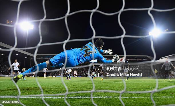 Andrew Lonergan of Bolton makes a save during the Sky Bet Championship match between Fulham and Bolton Wanderers at Craven Cottage on October 1, 2014...