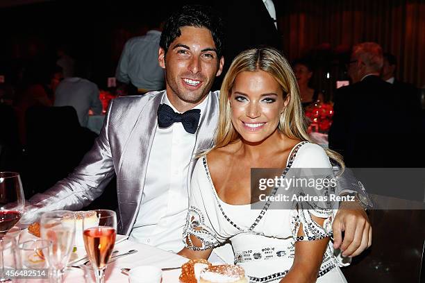 Sylvie Meis and boyfriend Samuel Deutsch attend the Pink Ribbon Award 2014 on October 1, 2014 in Zurich, Switzerland.