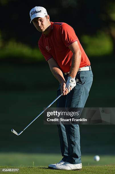 Daniel Brooks of England plays a shot during the weather delayed second round of the Nelson Mandela Championship at Mount Edgecombe Country Club on...