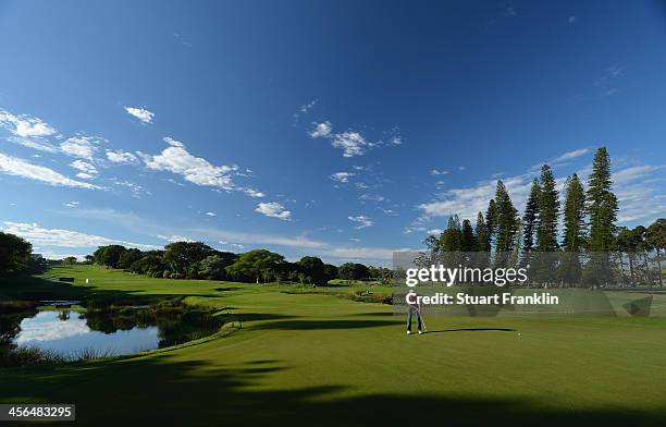 Daniel Brooks of England putts during the weather delayed second round of the Nelson Mandela Championship at Mount Edgecombe Country Club on December...