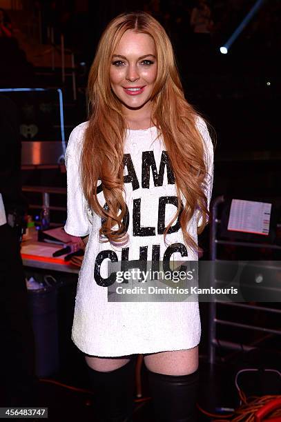 Lindsay Lohan poses backstage at Z100's Jingle Ball 2013, presented by Aeropostale, at Madison Square Garden on December 13, 2013 in New York City.